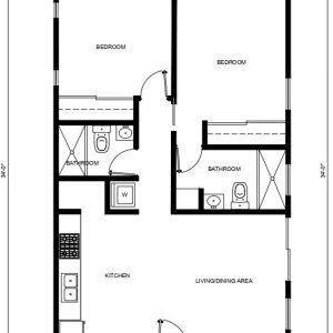 A floor plan showing a residential layout with two bedrooms, two bathrooms, a kitchen, and a living/dining area. The kitchen features appliances along the left wall, while both bathrooms include standard fixtures like toilets and what appear to be shower or tub enclosures. The open-concept living/dining area connects the spaces, with bedrooms positioned on opposite sides of the unit.