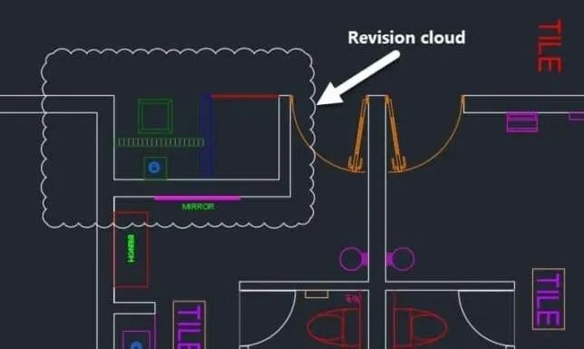 A CAD drawing displaying an architectural floor plan with various colored elements including green, blue, magenta, and orange lines representing different building components. An arrow points to a revision cloud, which is a standard drafting markup tool shown as a scalloped outline used to highlight areas requiring attention or changes. The word "TILE" appears on the right side of the drawing, and the plan shows rooms with doorways, fixtures, and other architectural elements typical of a building layout.