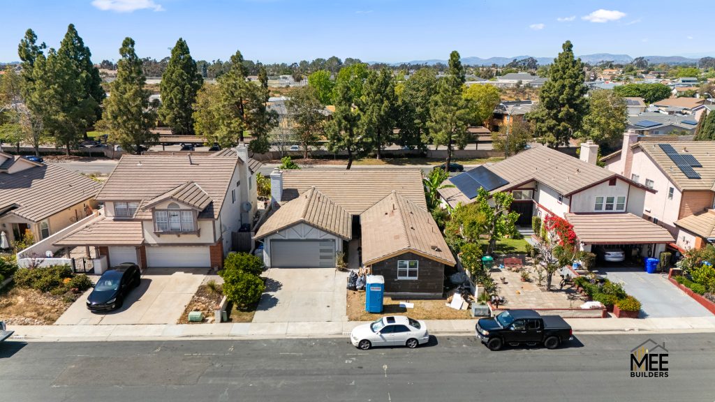 Aerial view of a Valley Center home showing utility and septic site conditions