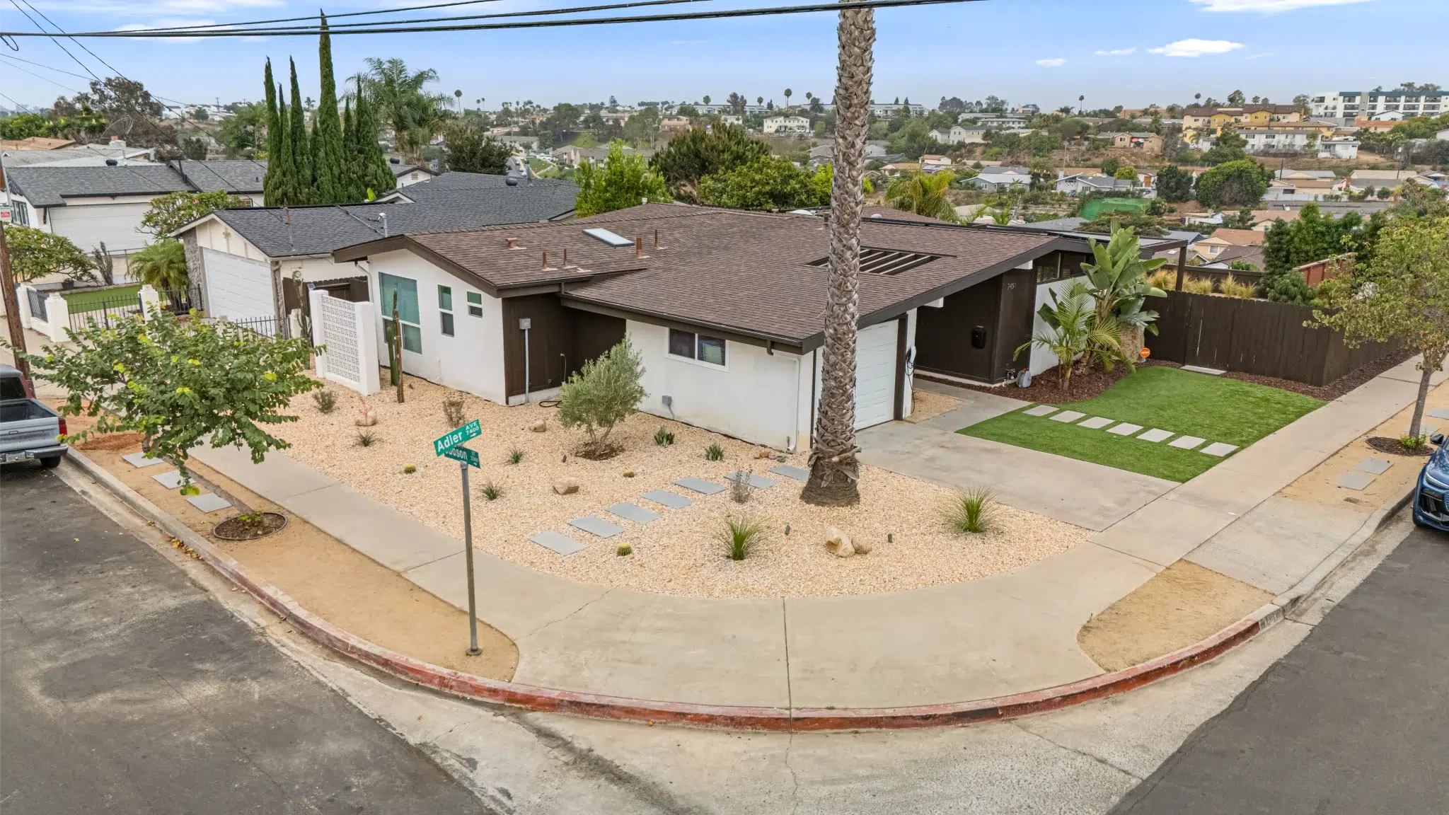 Corner aerial of the expanded San Diego home showing the 330 sq ft addition footprint