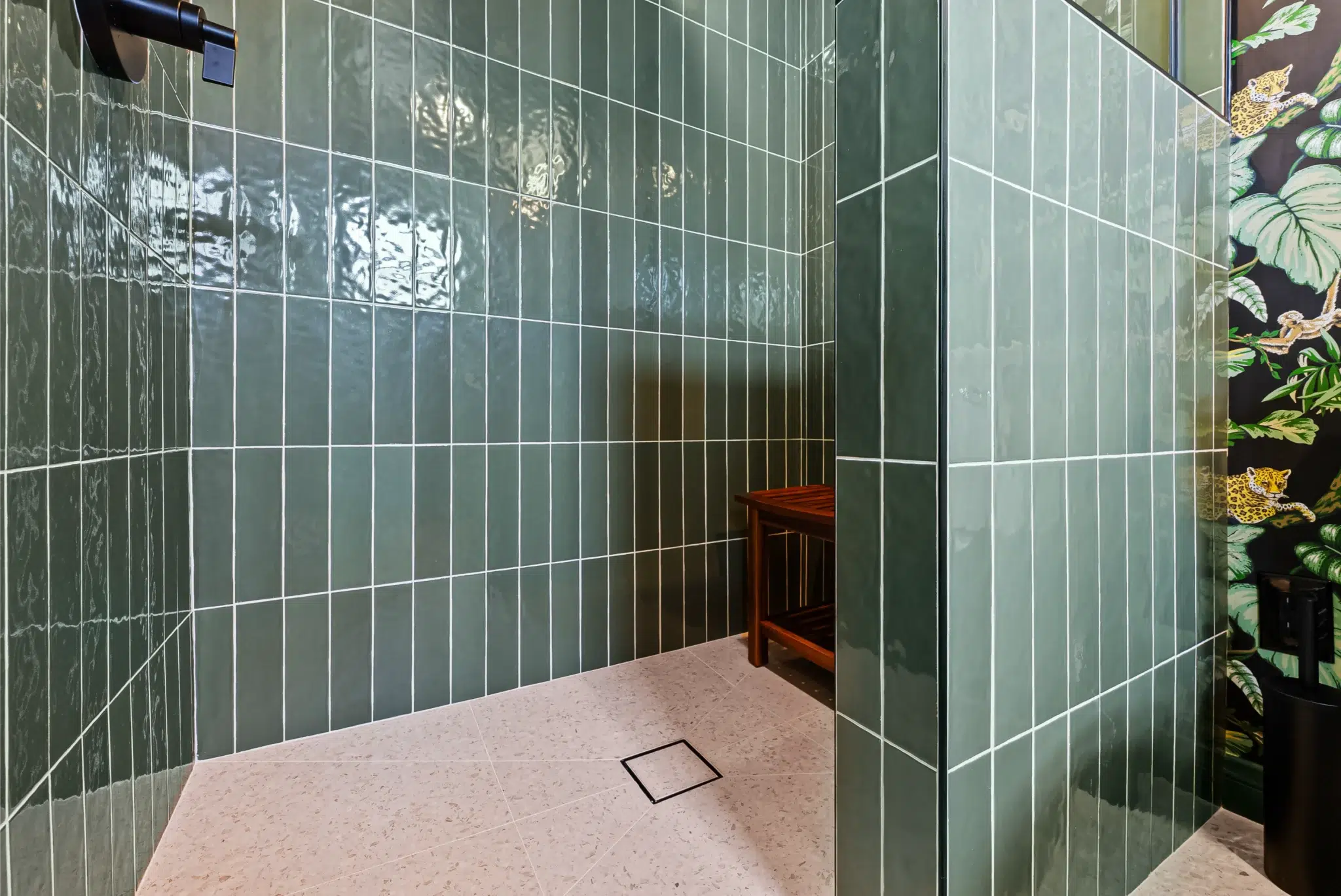 Green-tiled walk-in shower in the new Adler Avenue bathroom, San Diego