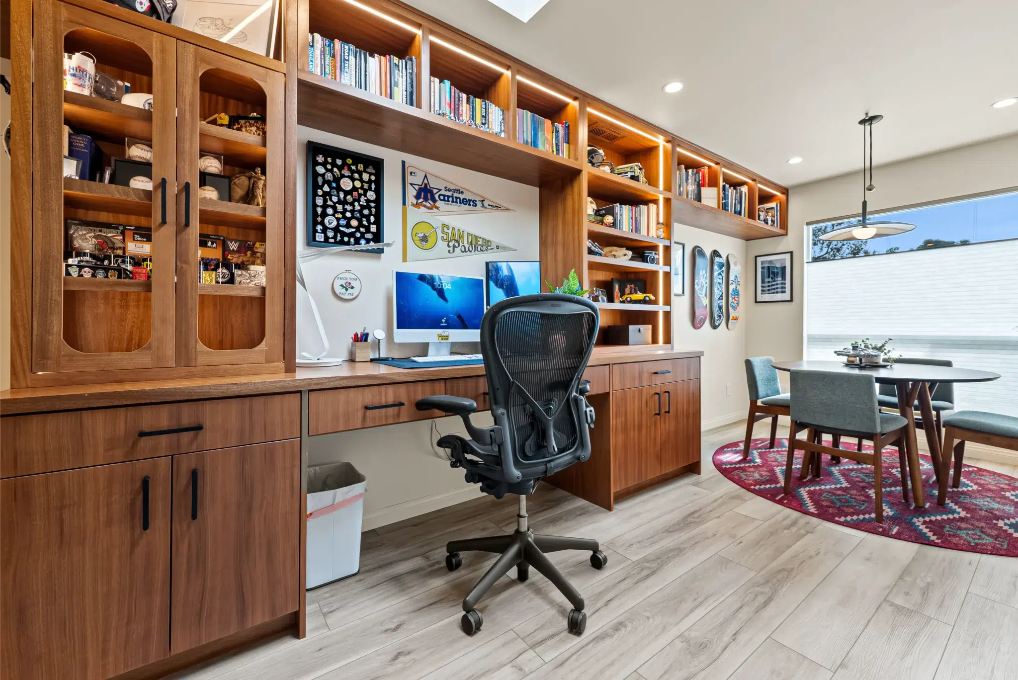 Custom wood built-in office shelving in a San Diego home addition