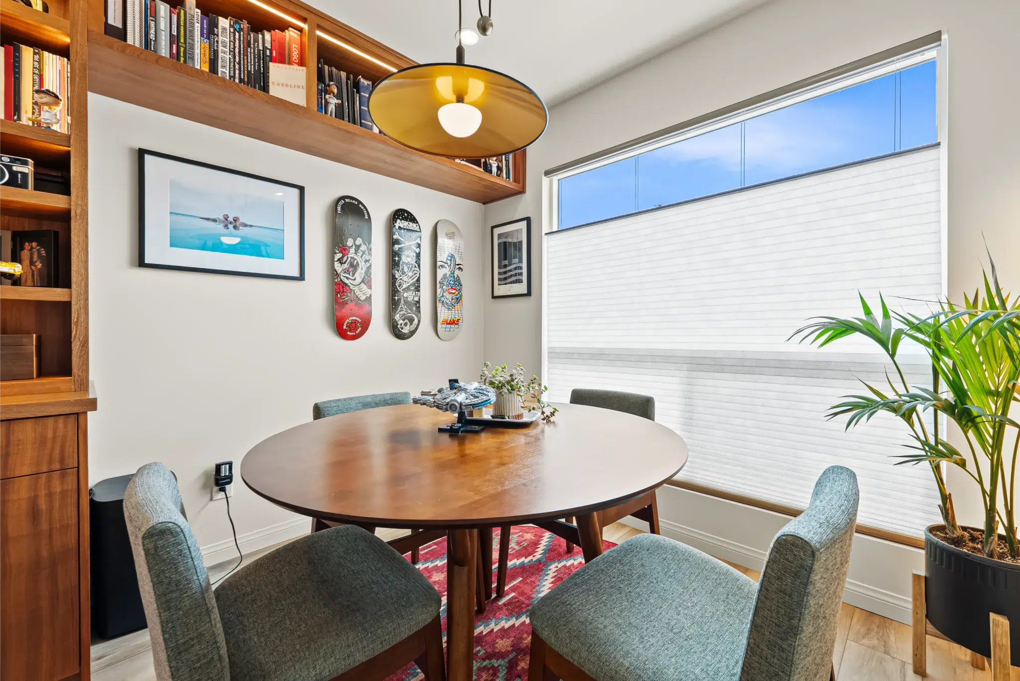 Dining nook with pendant lighting in the remodeled San Diego home