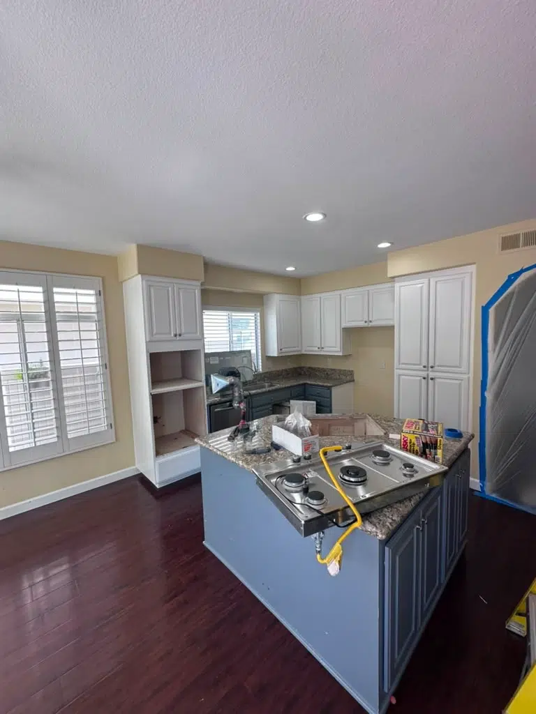 San Diego kitchen at the beginning of the demolition phase showing existing cabinetry before removal.