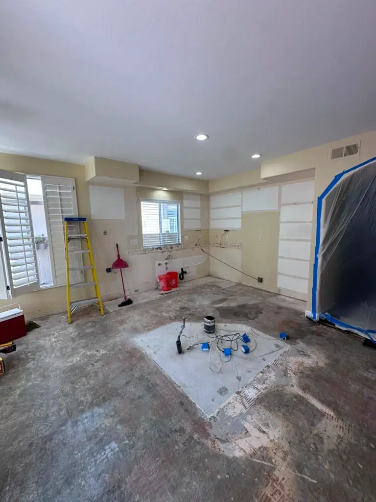 Carmel Valley kitchen completely stripped down to the bare studs ready for new plumbing and electrical rough-ins.