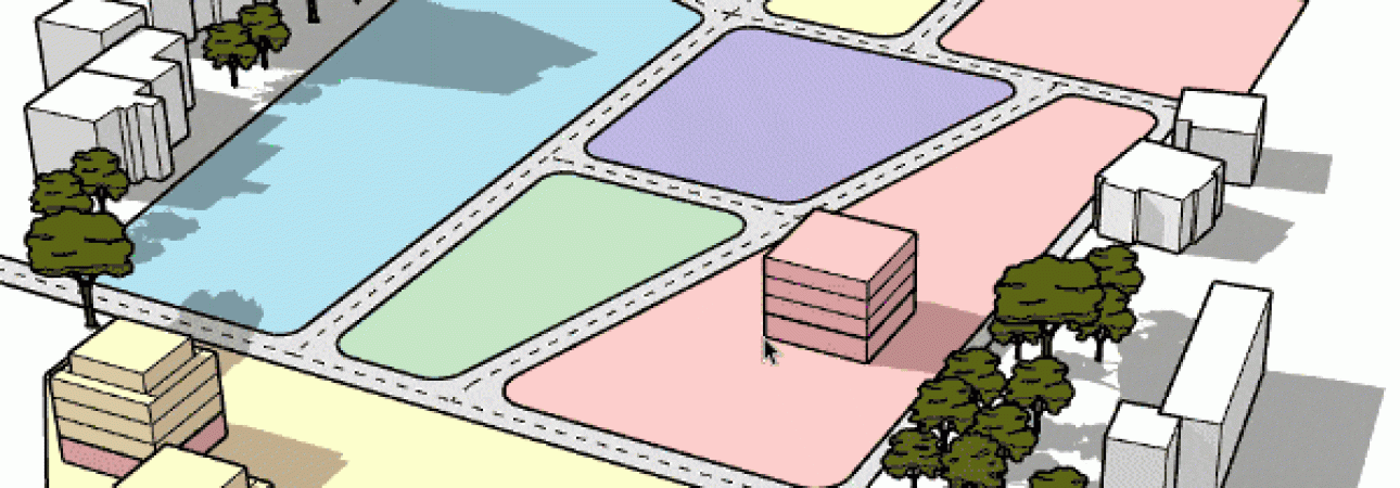 An isometric architectural site plan showing an urban development layout with multiple colored zones including light blue, purple, green, pink, and yellow sections representing different land uses or building areas. The plan includes white building blocks of varying heights, green trees scattered throughout, and appears to show a mixed-use development with residential towers, open spaces, and public areas. The three-dimensional rendering provides a bird's eye view of the planned urban district with clear delineation between different functional zones.